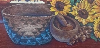 Detail of mural showing basket, mortar and pestle