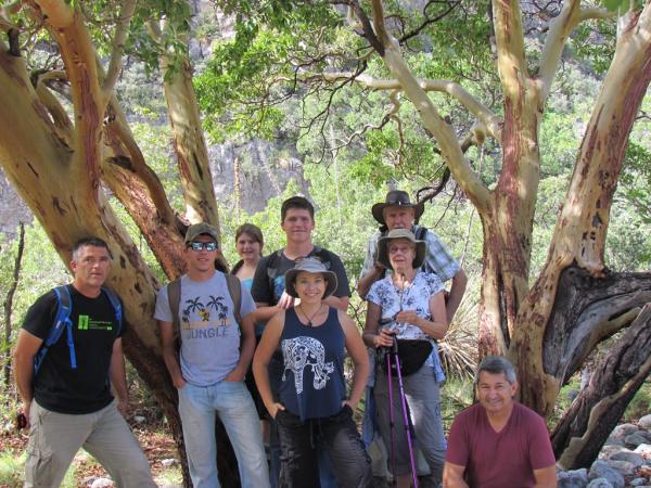 Group photo under large Madrone