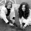 Yoko and John planting acorns